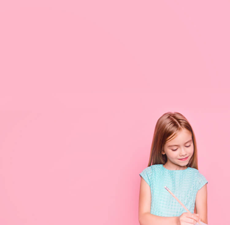 Girl writing in book